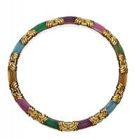 A gold and gemstone Primavera necklace, Bulgari, circa 1980's. The interlocking gold motifs with alternating domed and fluted aquamarine, citrine, tourmaline and peridot sections. 18ct yellow gold. Weight 166.4 grams. Inner circumference 40cm. Signed Bulg