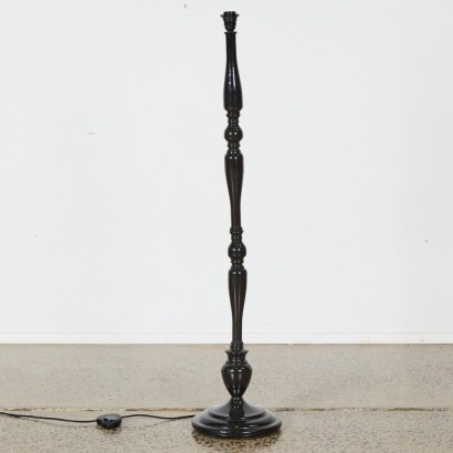 A Black Metal Standard Lamp With White Shade