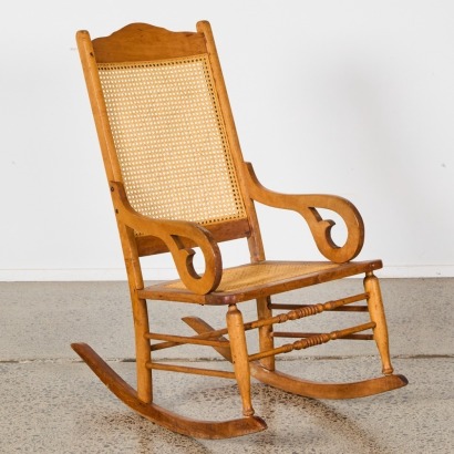 An Antique Rattan Rocking Chair