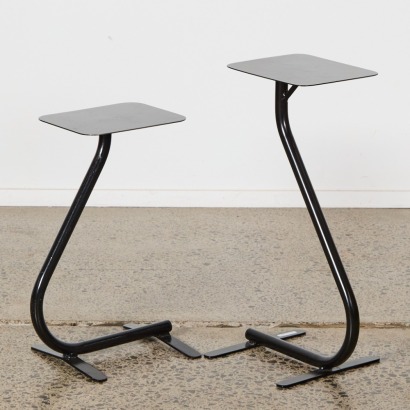 A Pair of Black Metal Side Tables