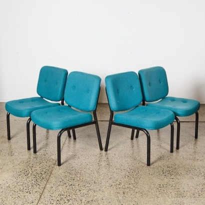 A Set of Four Retro Padded Chairs