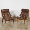 A Pair of Leather Hunter Chairs By Torbjorn Afdal