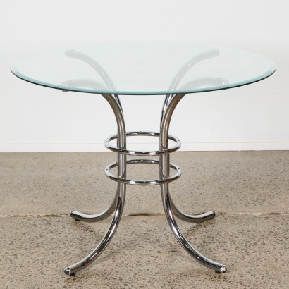 A Vintage Round Chrome And Glass Dining Table