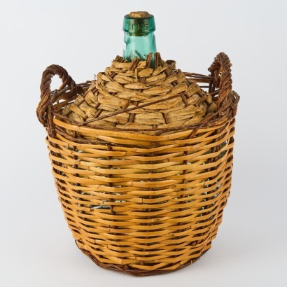 A Vintage Demijohn Woven Wicker Bottle