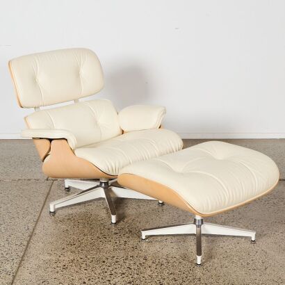 An Eames Lounge Chair And Ottoman In Cream Leather And Ash, Charles And Ray Eames For Herman Miller