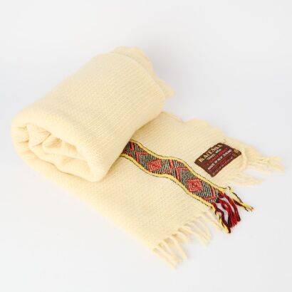 A Kaitaka Travel Rug with Maori Pattern Border by Onehunga Woollens