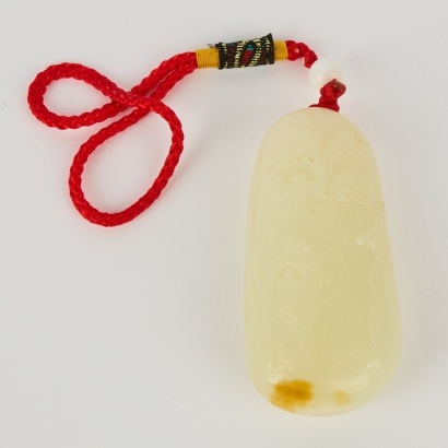 A Chinese White Jade Carved &lsquo;Figural&rsquo; Pendant