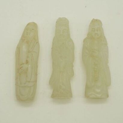 A Set Of Three Chinese White Jade Guanyin Pendants