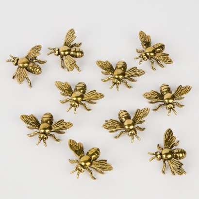A Collection of Ten Brass Bees