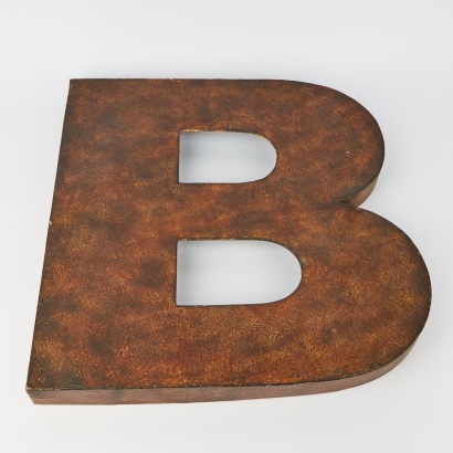 A Large Metal B Wall Sign