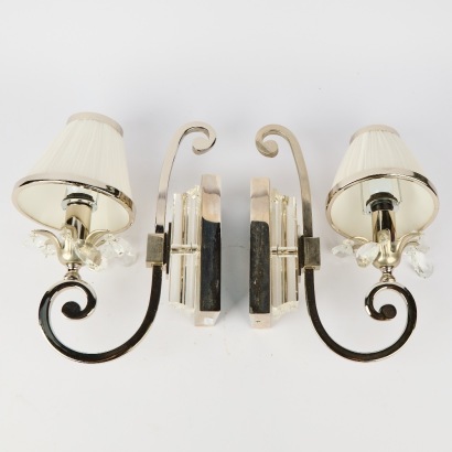 A Pair of Wall Sconces By Eunice Taylor