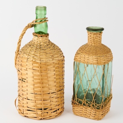 A Pair of Cane Wrapped Bottles