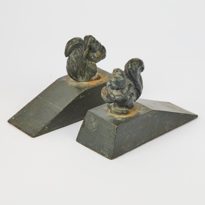 A Pair of Cast Iron Door Stops with Squirrel Motif