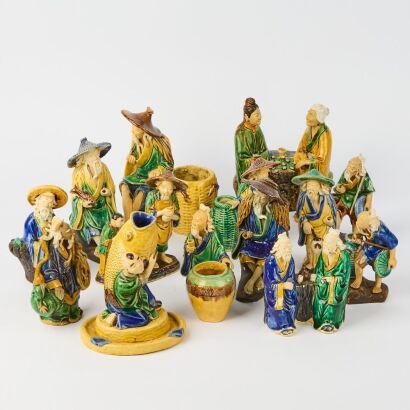 A Group of Fourteen Early to Mid-20th Century Chinese Foshan Pottery Figures