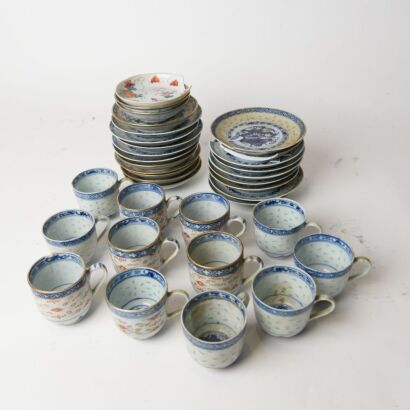 A Group of Twenty-two Chinese Early 20th Century Blue and White &lsquo;Dragon&rsquo; Cups and Saucers