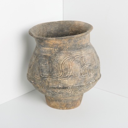 A Comb Decorated Vessel, China