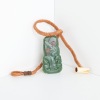A Stone Tool Carved Hei Tiki by Matiu Bartlett, Aotearoa