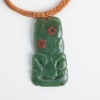 A Stone Tool Carved Hei Tiki by Matiu Bartlett, Aotearoa - 2