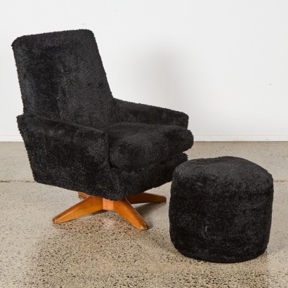 A Black Faux Fur Reupholstored Mid-Century Swivel Chair And Footstool