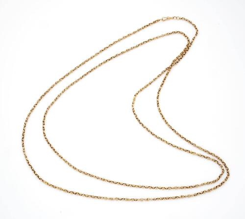 An antique gold muff chain, of plain polished oval link design, hung with a swivel catch. 9ct yellow gold. Weight 34.49 grams. Length 170 cm.