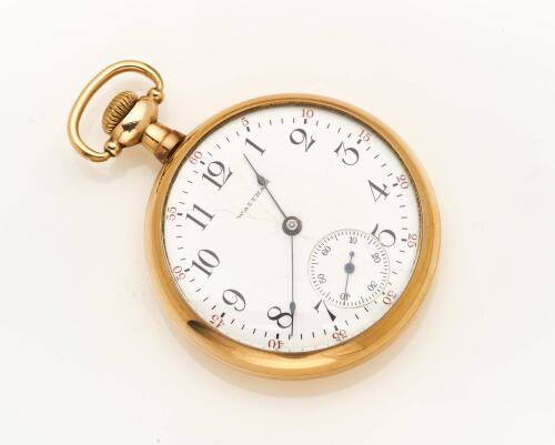 A Gentleman's gold plated openface pocket watch, Waltham. Crown wind. 47mm. White enamel dial and printed black Arabic numerals, subsidiary seconds. Dial and movement signed. Case marked S.W.C.CO, 20 Years. Screw back case.