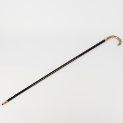A Walking Stick with a Silver Plate Handle