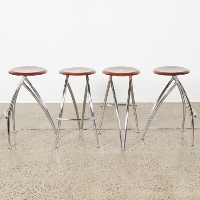 A Set Of Four Post Modern Bar Stools