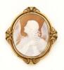 An antique cameo brooch, the oval helmet shell depicting an angel. 15ct yellow gold. Weight 20.44 grams. Length 7cm. Width 6cm.