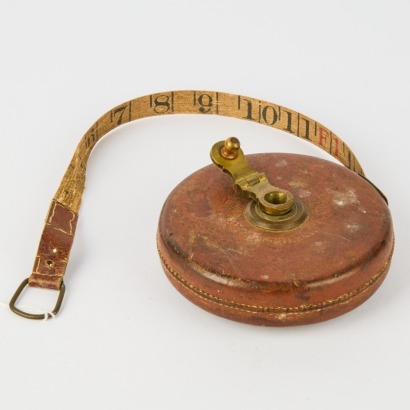 A Leather Cased Tape Measure