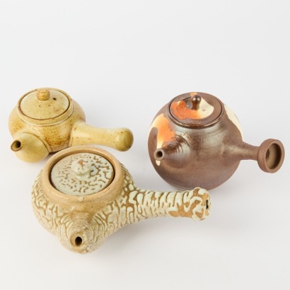 A Trio Of Japanese Side Handle Teapots