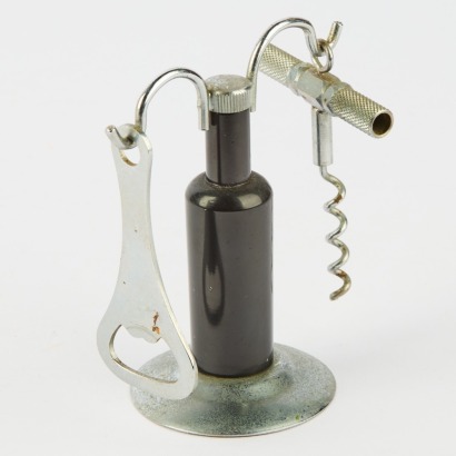 A Mid Century Bar Set Cork Screw And Bottle Opener On Stand