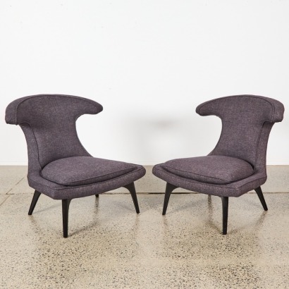 A Pair of Modernist Wingback Chairs