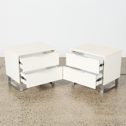 A Pair of White Bedside Tables with Sleigh Base
