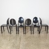 A Suite Of Six Kartell Style Black Ghost Chairs