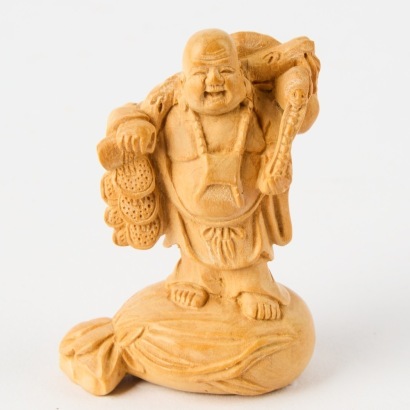 A Wood Netsuke of a Man