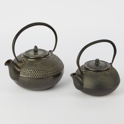 A Pair Of Black Japanese Teapots