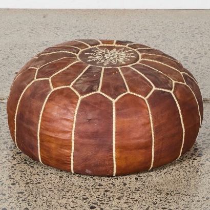 A Vintage Handmade Leather Moroccan Pouffe