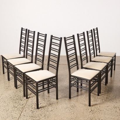 A Suite of Eight Charles Rennie Mackintosh Style Ladder Back Chairs