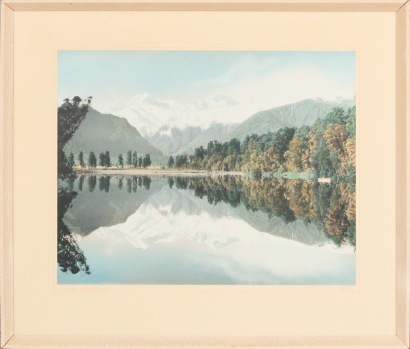 A Whites Aviation Lake Matheson Hand Coloured Photograph in Original Frame