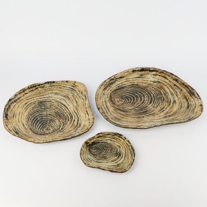 A Trio Of Glass Wood Grained Decorative Plates