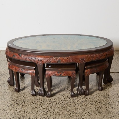 A Set of Seven Chinese Early 20th Century Hand-carved 'Figures and Landscape' Oval Tea Table