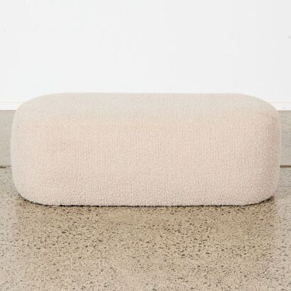 A Soft Grey Boucle Oval Ottoman