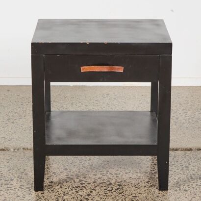 A Single Bedside Table with a Leather Handle