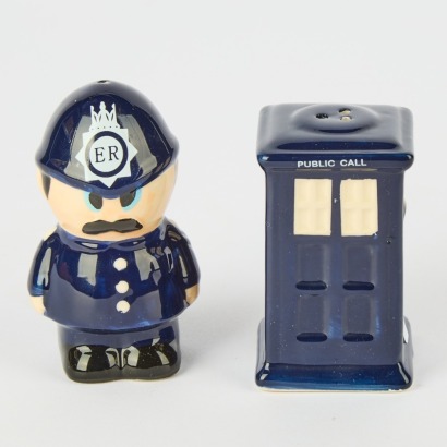 A Dakota Ceramic Policeman and Police Box Salt and Pepper Shakers