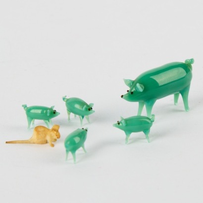 A Five Miniature Glass Pigs and a Bone Mouse