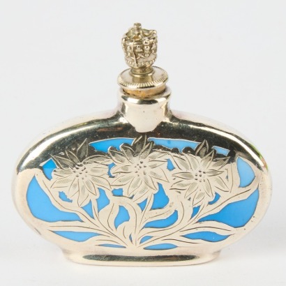 An Art Deco Perfume Bottle with Silver Floral Design