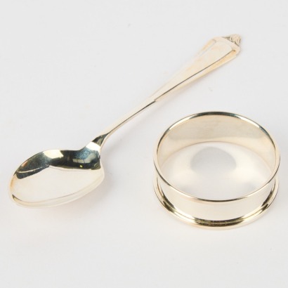 A Sterling SIlver Spoon and Napkin RIng by Broadway & Co 0.026kg.