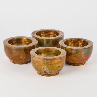 A Set Of Four Copper-Painted Candle Holders By Broste Copenhagen