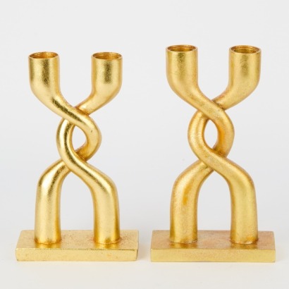 A Pair Of Gold Twist Candle Holders