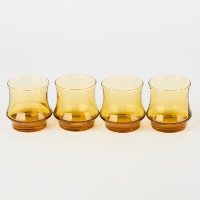 A Set of Four Amber Glass Glasses